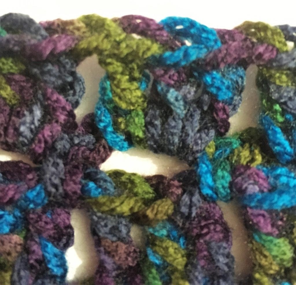 Close up of crochet stitches for neck warmer