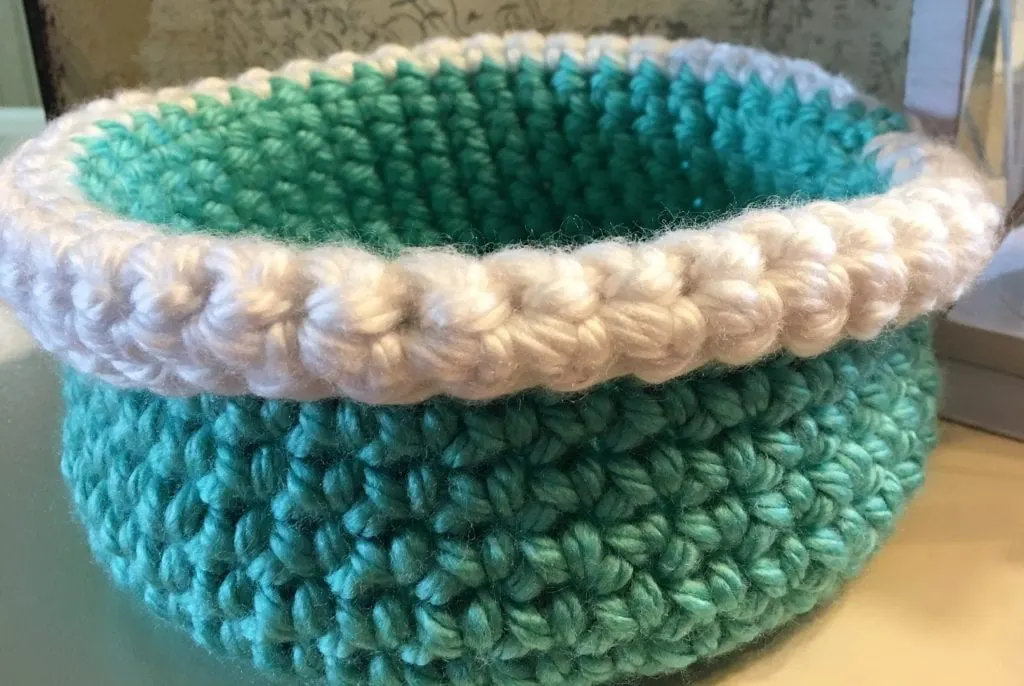 Top folded down on large crochet basket