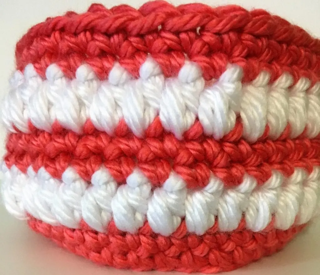 close up of coral and white basket