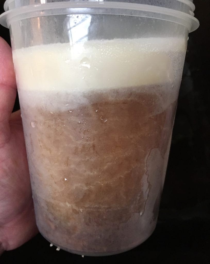 Frozen ham juice with fat on top