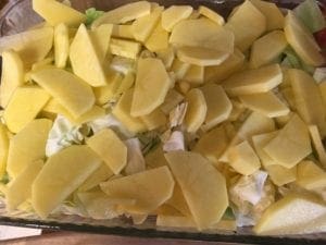 Cabbage and potatoes layered