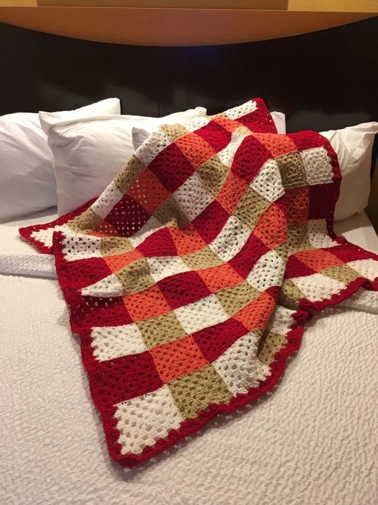 Chic Colorful Granny Square Throw on bed