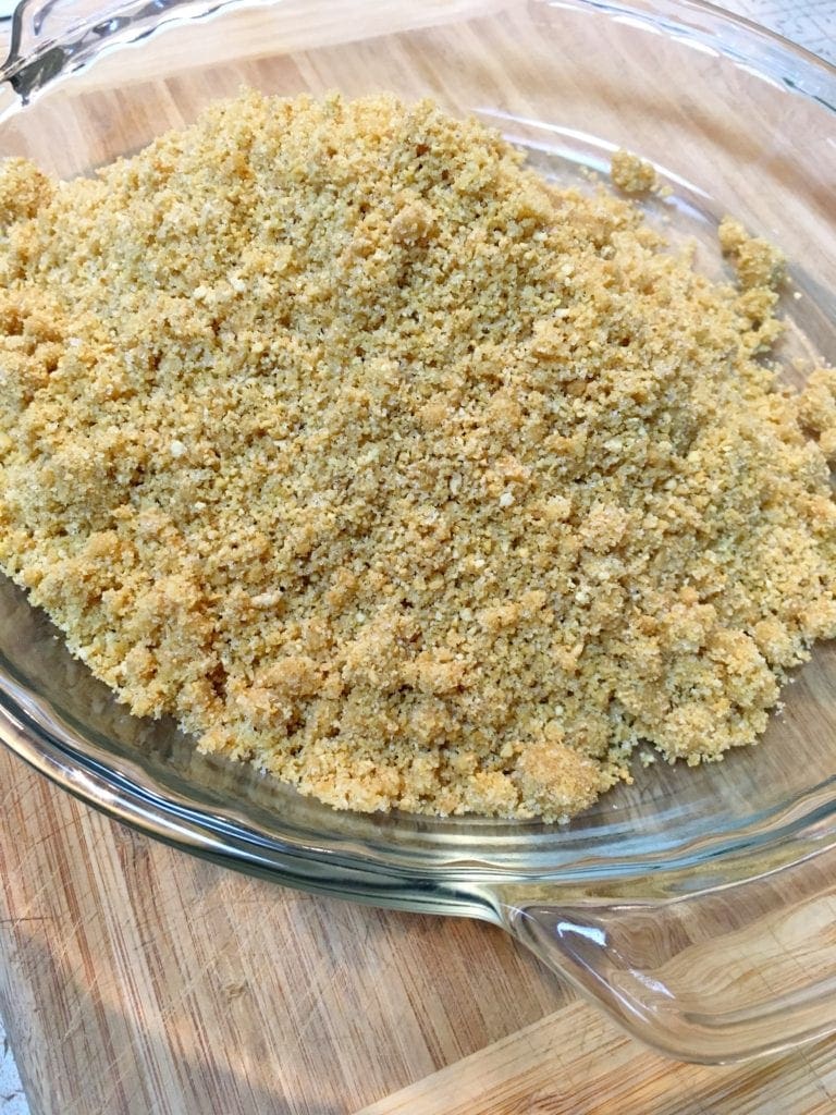 Transferring Graham Cracker Mixture to Pie Plate