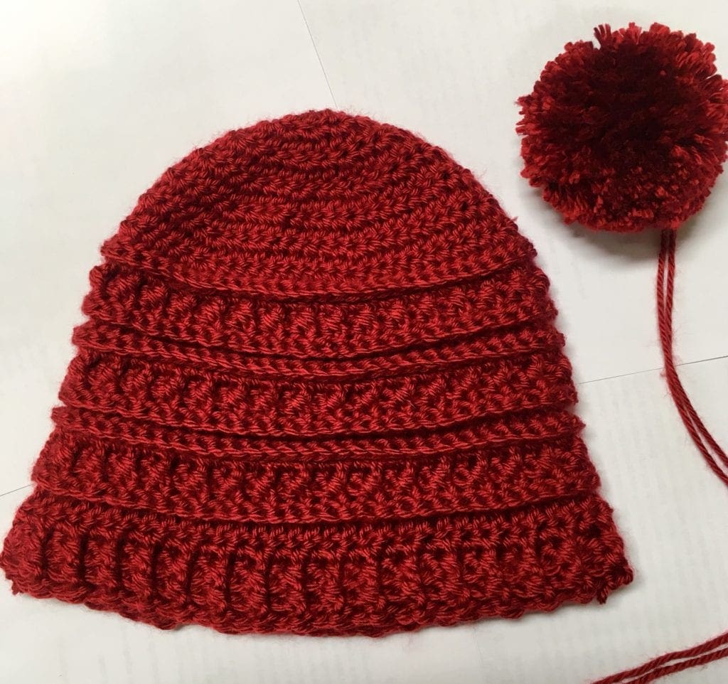 Pom-Pom and crochet hat