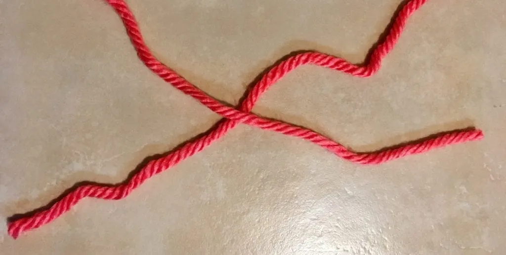 Step 1 of Tying a Square Knot