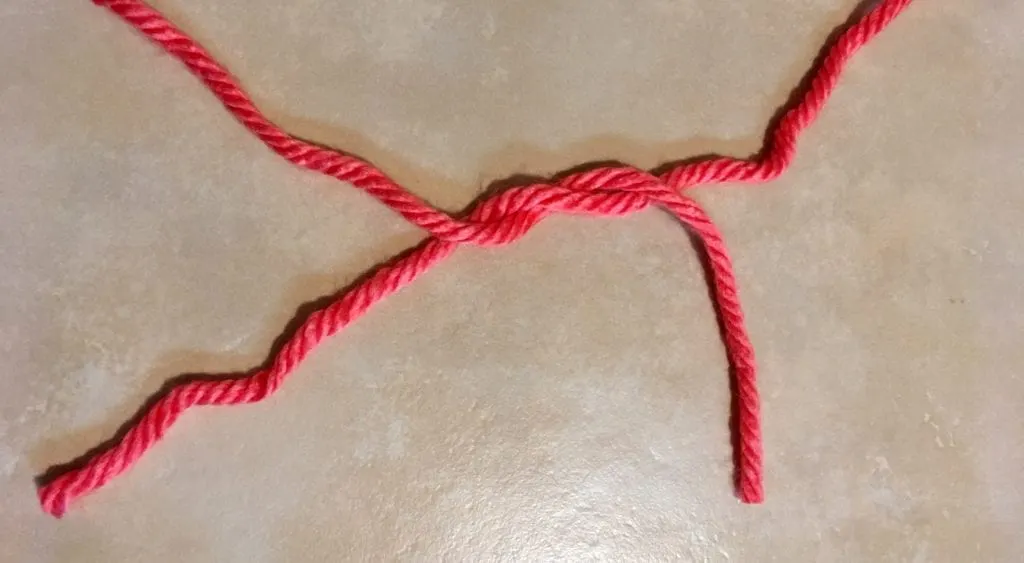 Step 2 of Tying a Square Knot