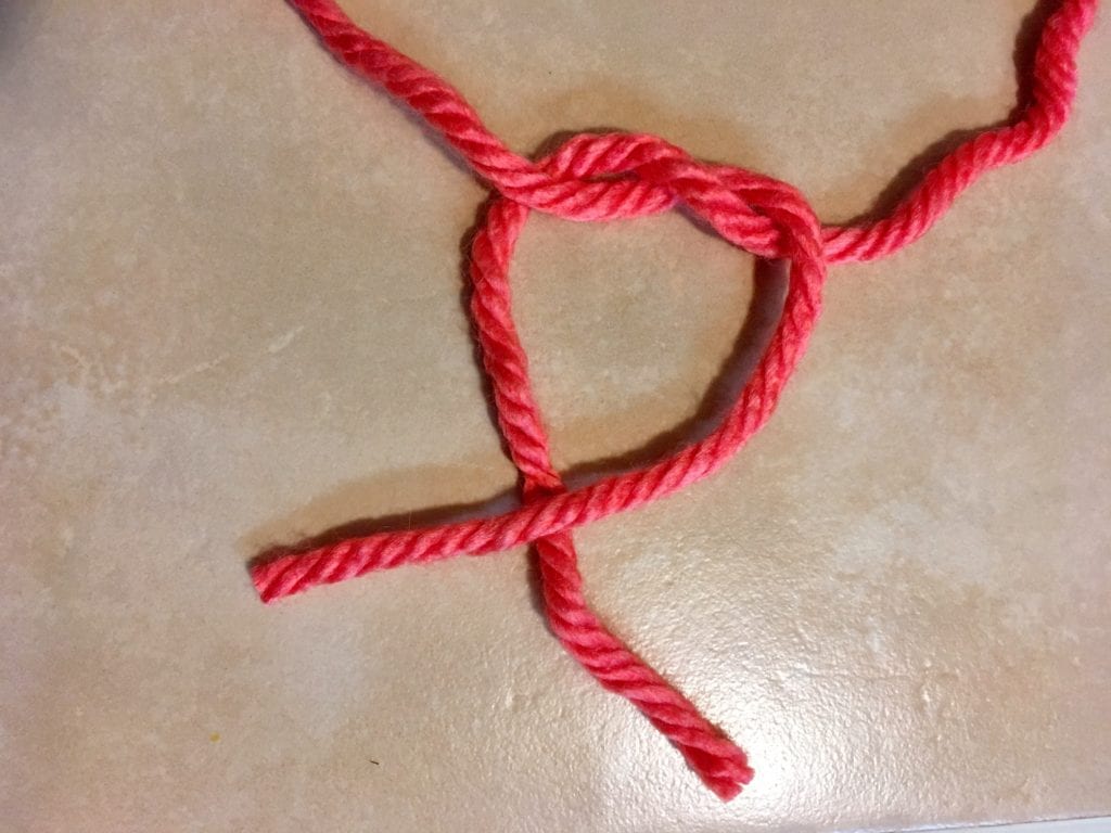 Step 3 of Tying a Square Knot