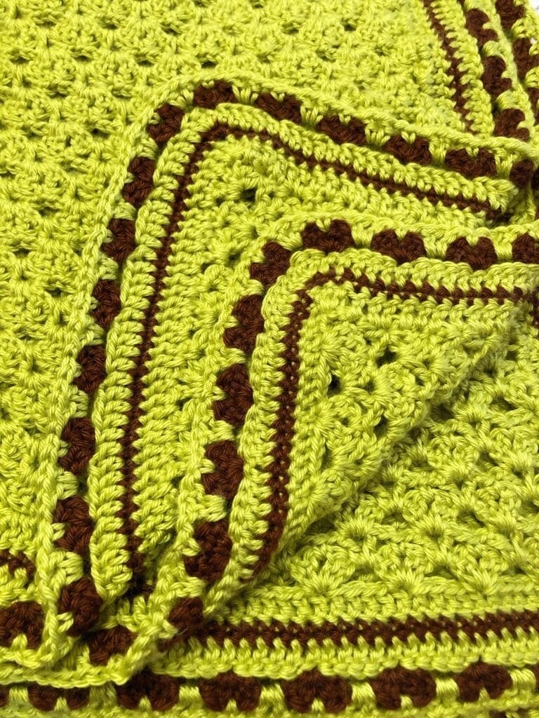 Chartreuse and Chocolate Blanket with the Edge Folded Up