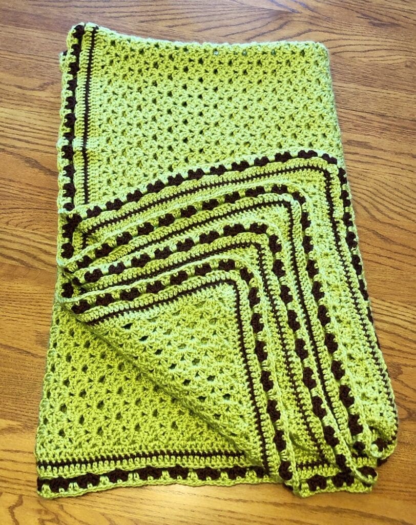 Folded Glorious Springtime Blanket Folded showing Crochet Edge