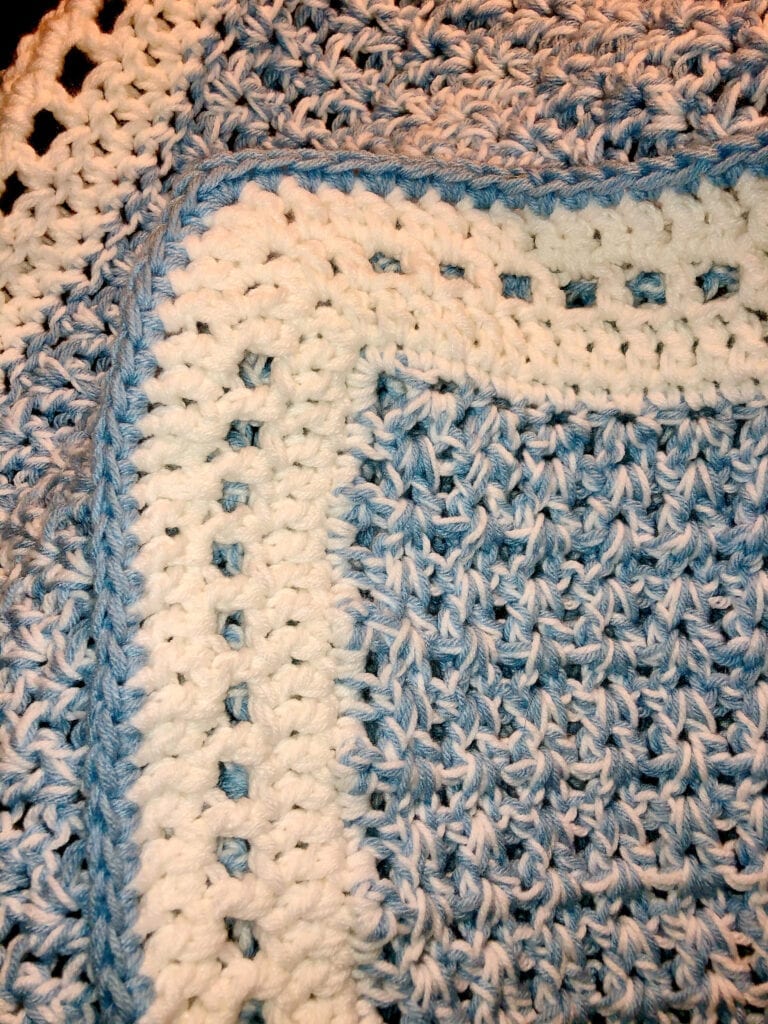 Crochet V-Stitch Blanket with Sky Blue Yarn for the Last Round