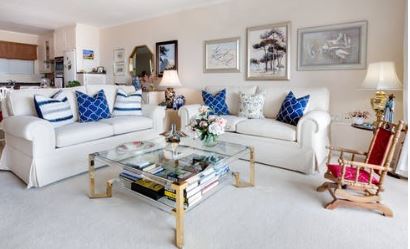 White Living Room Decor with Blue Accent Pieces