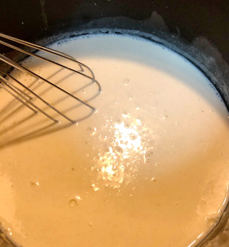 Incorporating Milk into the Flour and Butter. Making a Roux.