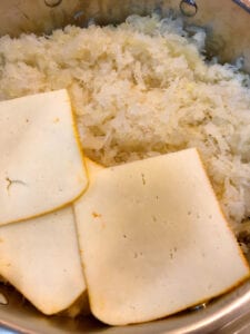 Layering Cheese on the Sauerkraut