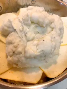 Adding Mashed Potatoes to the Casserole