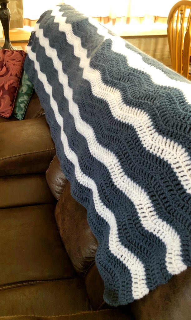 Crochet Blanket Draped Over Back of Sofa