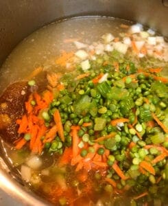 Adding Ham Juice, Onion, Carrot, Celery, and Split Peas to Soup