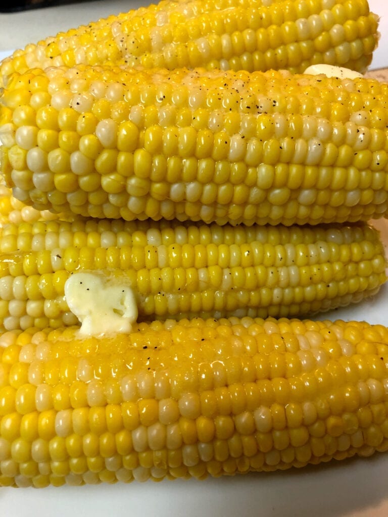 Cooked Corn on the Cob with Butter Melting on it