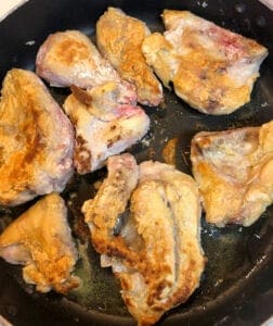 Turning Chicken in Skillet