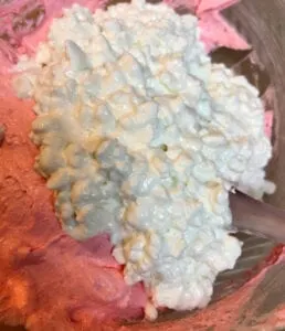Adding Cottage Cheese to Pink Fluff Mixture