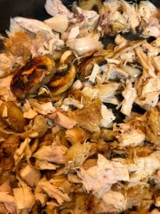 Adding Chicken and Garlic to the Mushrooms and Onions in the Skillet