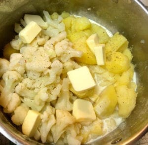 Butter, Cream, Salt, and Pepper added to the potatoes and cauliflower