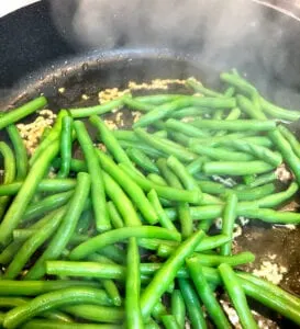 Adding Beans to Garlic in Skillet