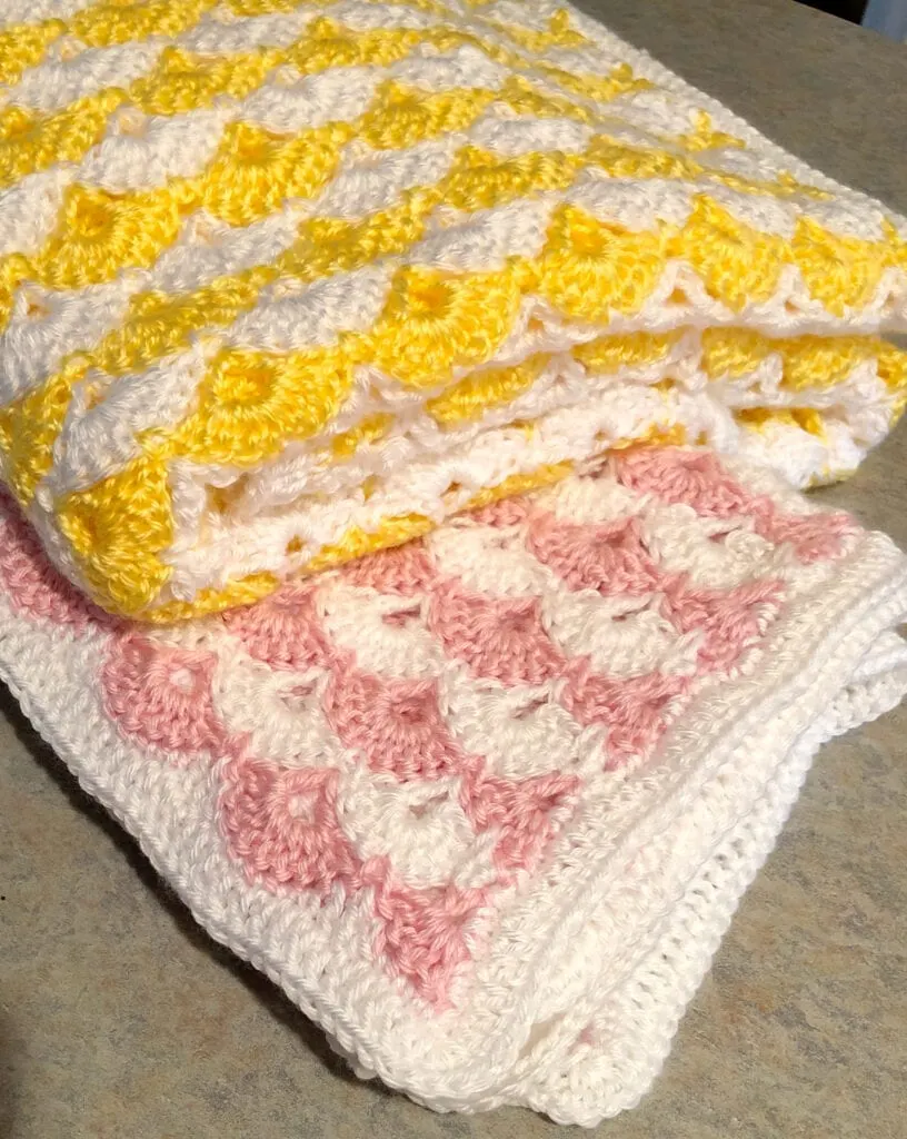 Pink and White - Yellow and White Shells Blankets Folded