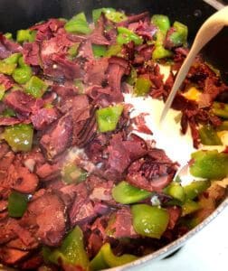 Adding Cream to the Beef Fettuccine