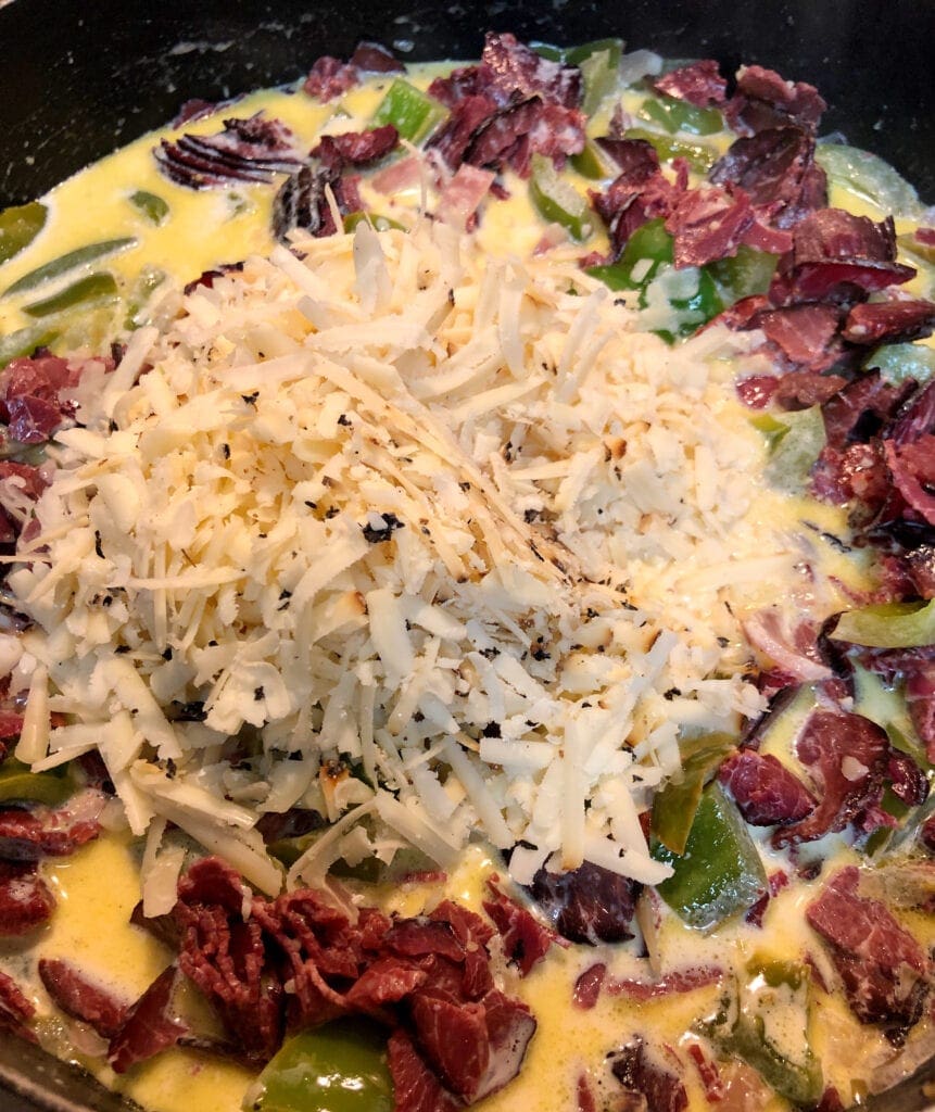 Adding Shredded Cheese to Cream and Beef