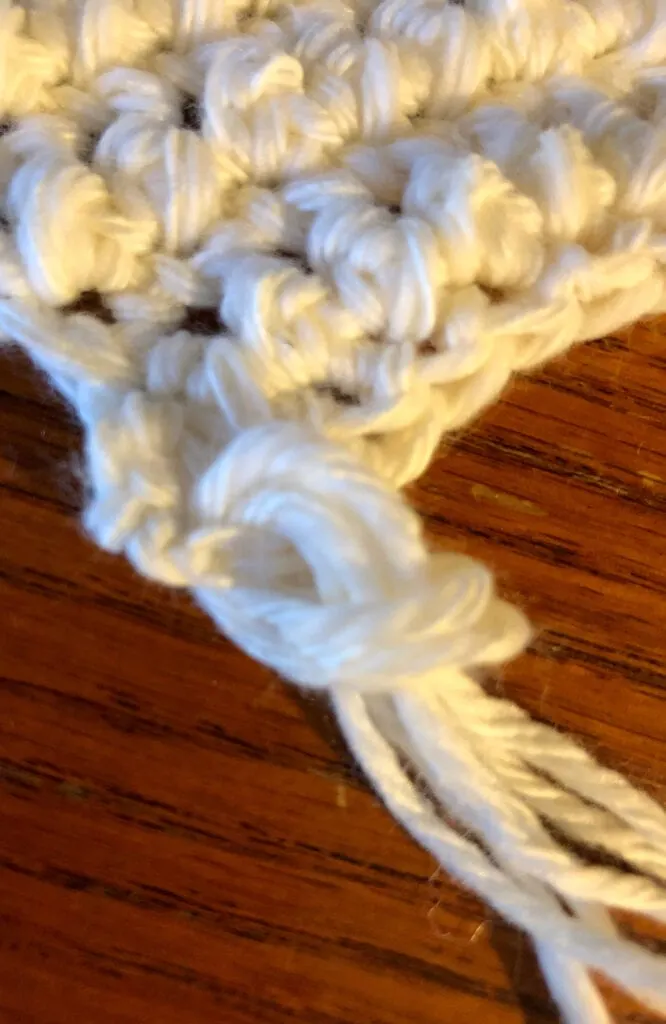 Pulling Yarn Strands Through the Stitch for Fringe
