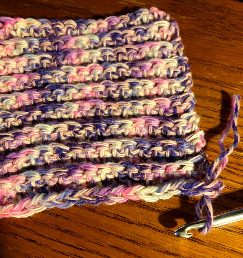 Bringing Folded Yarn Through the Stitch for adding the Fringe