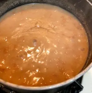 Simmering Refried Beans until thickened