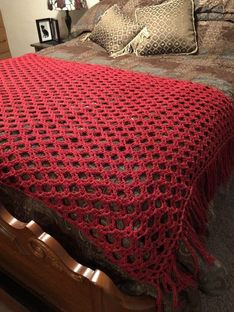 Crochet Lacy Bed Scarf Displayed on Bed