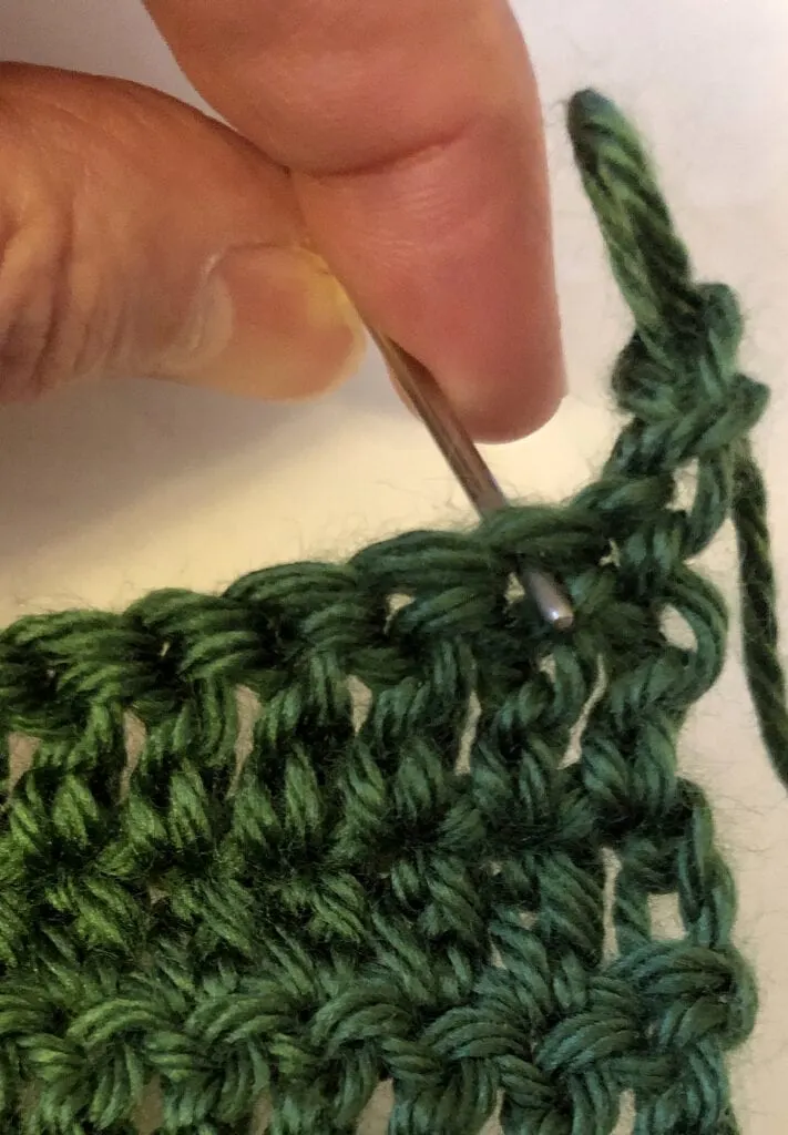 Showing Where to Put the First Stitch in the Double Crochet Row