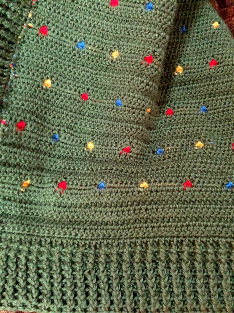 Back Side or Wrong Side of Festive Light Crochet Blanket