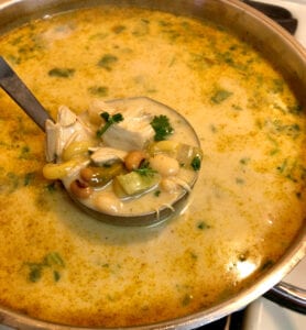 Serving Chicken Chili out of the Kettle with a Ladle