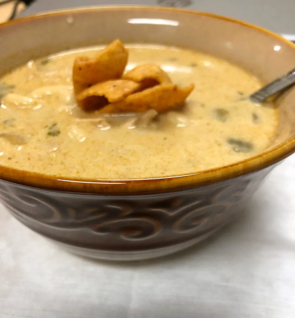 Creamy Chicken Soup Served with Corn Chips