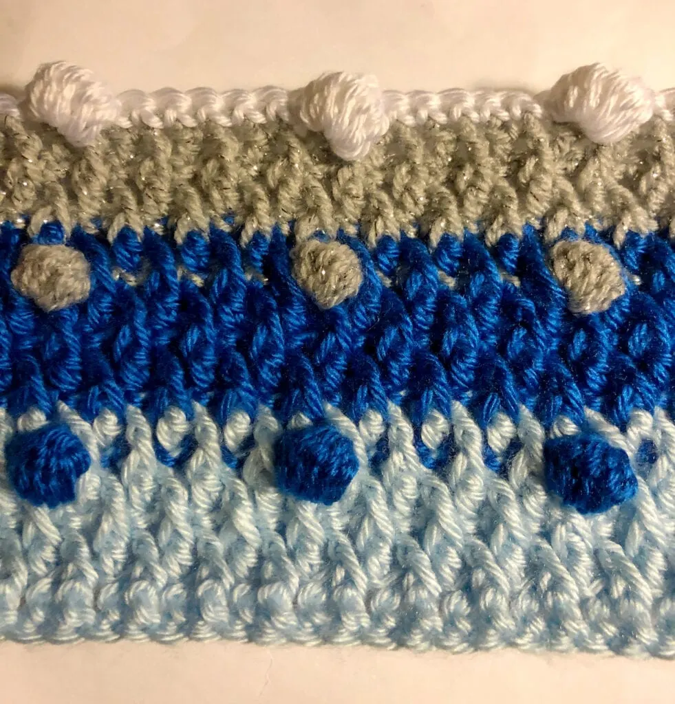 Crocheting with the Fourth Color of Yarn in the Bobble Stitch Row