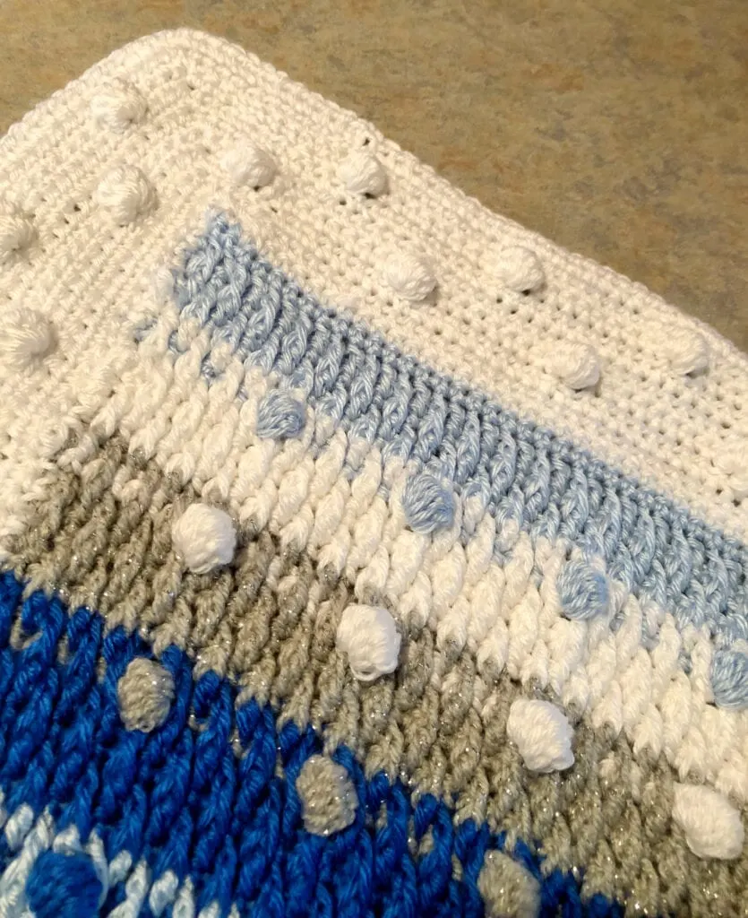 Close up of Bobble Texture Blanket Corner and Border