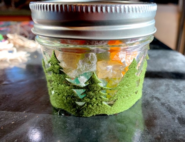 Old Fashioned Rock Candy Jar Decorated with Pine Tree Ribbon