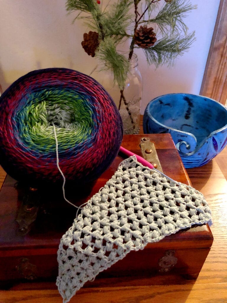 Beginning the Serendipity Crochet Shawl Showing yarn bowl and first 12 inches of shawl
