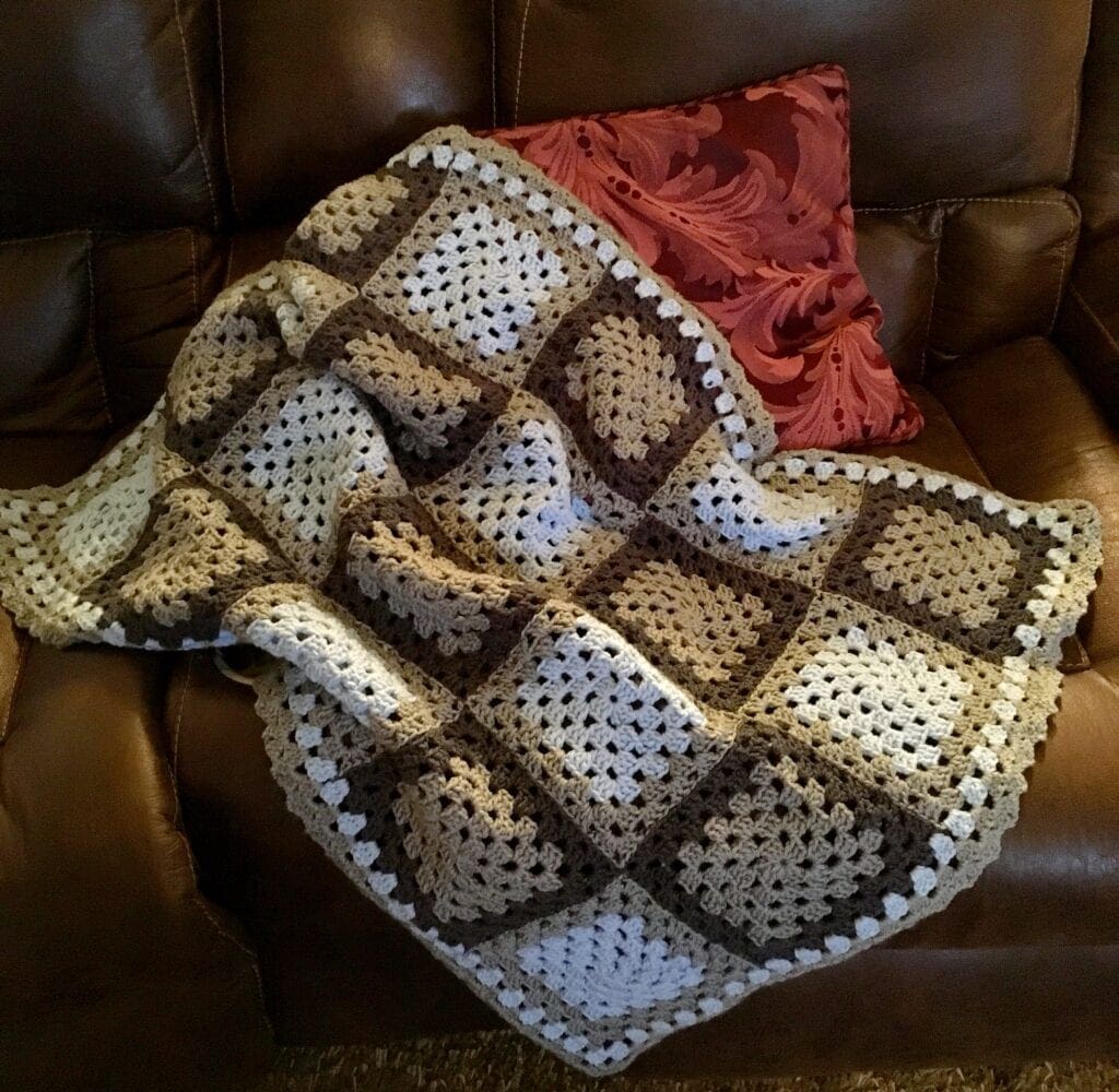 Easy Baby Blanket for a Boy Displayed on Sofa