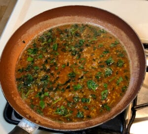 Fresh Parsley Added At the End to the Buttery Sauce