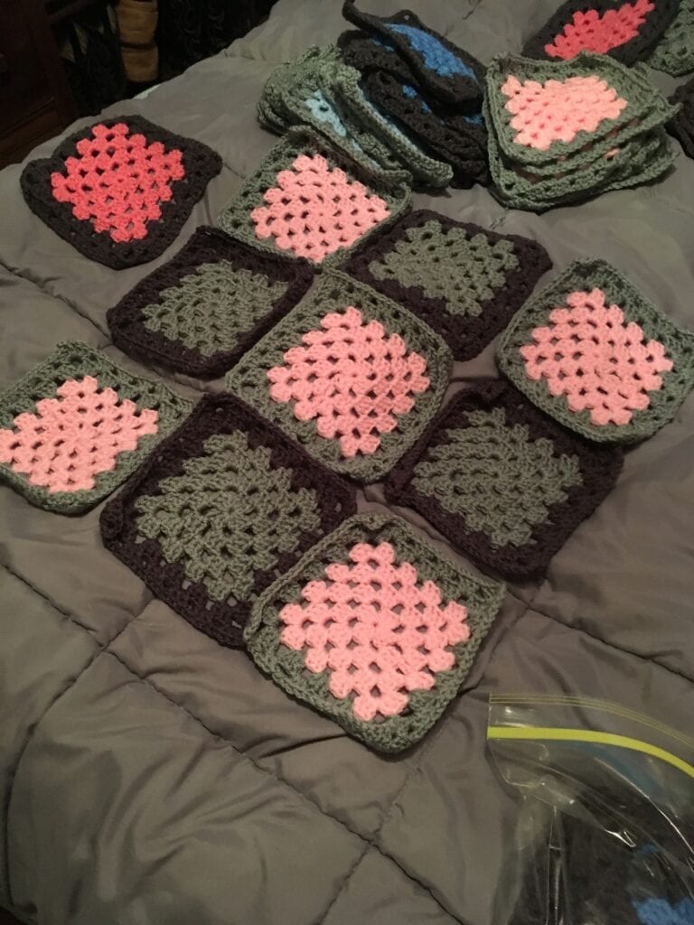 laying out crochet squares to join