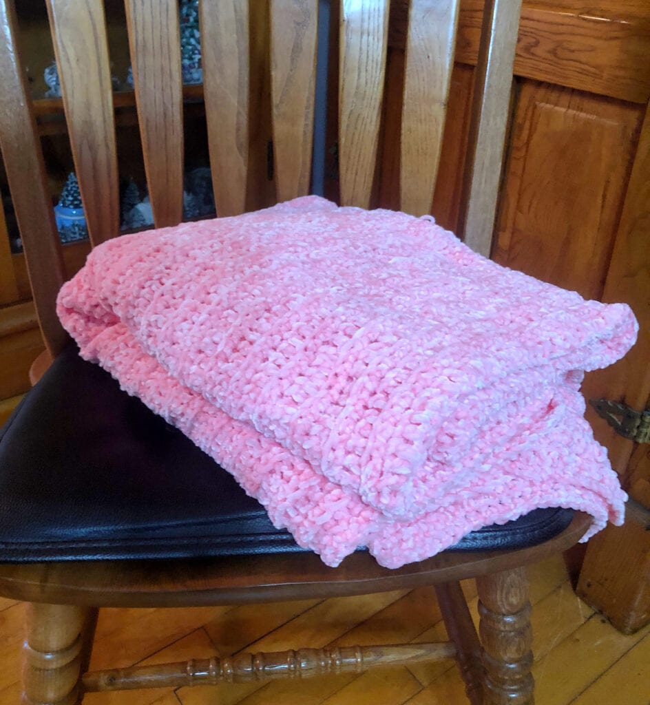 Chunky Crochet Blanket Folded on Chair