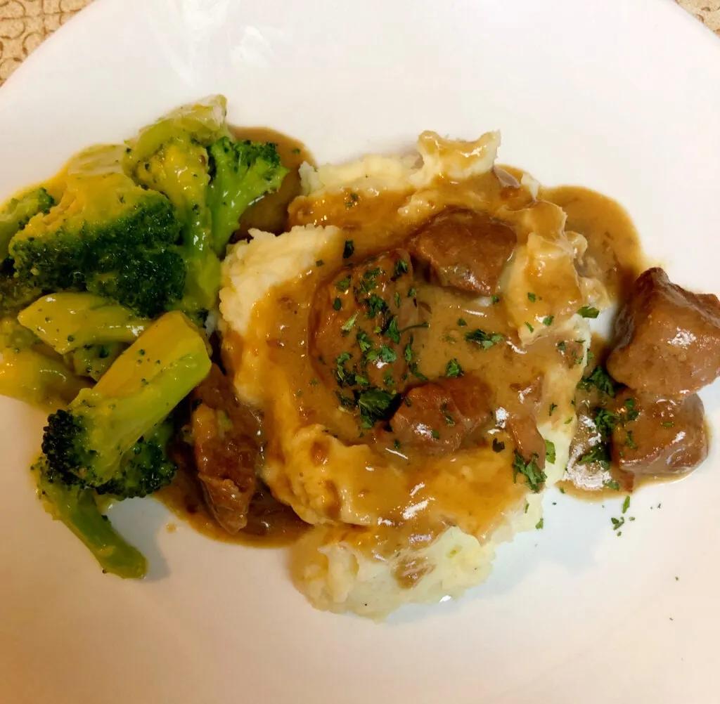 Beef Tips, Mashed Potatoes, Gravy, Broccoli and Cheese