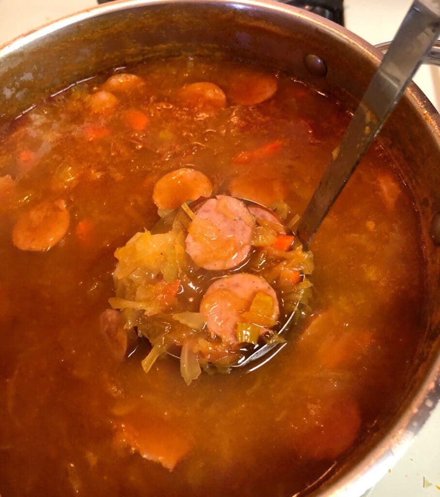 Serving Kielbasa and Sauerkraut Soup