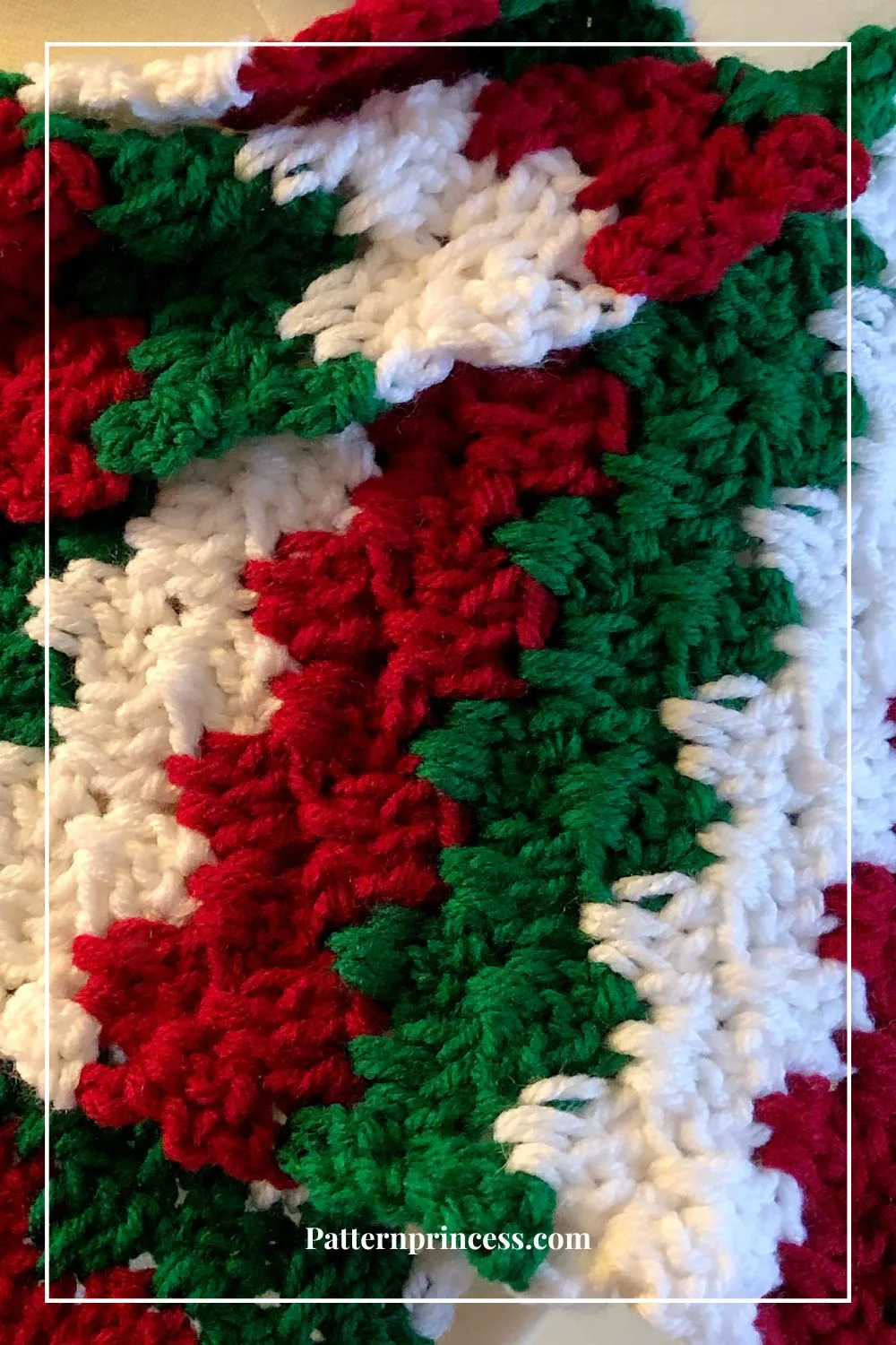 Close up of Crochet Stitch in White Green and Red