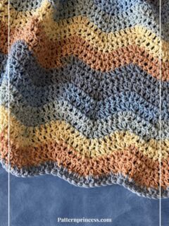 Close up of Ripple Blanket in Beach View yarn