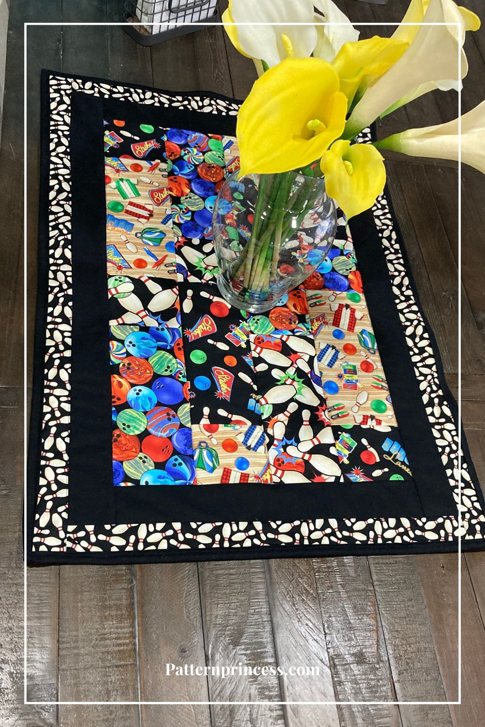 Beginner Rectangle Quilted Table Runner Displayed with Flowers